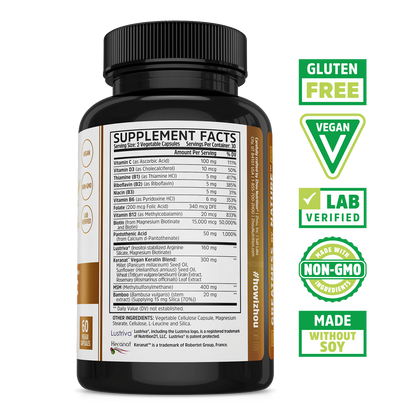 A Zhou Nutrition Hairfluence bottle shows its nutrition label with icons for biotin, hair growth, gluten free, and vegan.