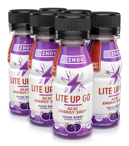 Six bottles of Zhou Nutrition Lite Up GO energy shots in mixed berry flavor, placed closely together.