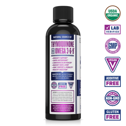 Black Seed Oil Liquid by Zhou Nutrition in a black bottle, USDA Organic & Vegan certified, with Omega 3-6-9 on label.