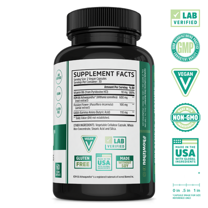 Black bottle labeled Calm Now by Zhou Nutrition, showing supplement facts and vegan botanical blend certification badges.